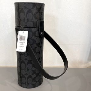 NWT Coach wine carrier bag in charcoal, 13” high, 4.5” diameter, snap closure